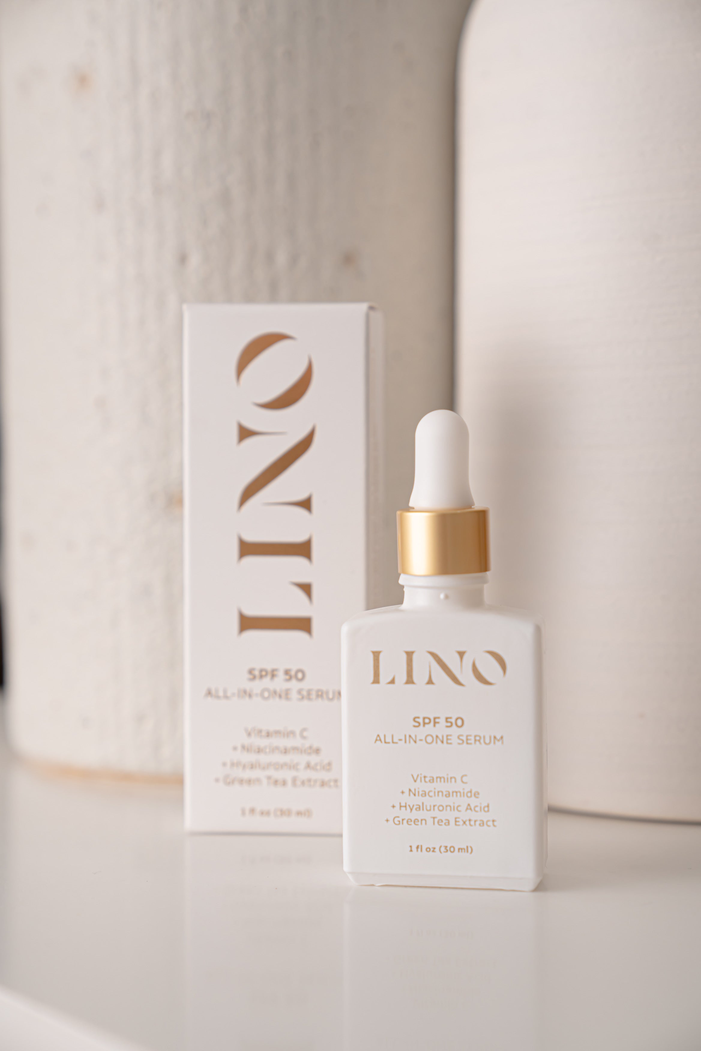 LINO skincare serum bottle with dropper and packaging